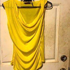 A yellow blouse good for the day or night life.